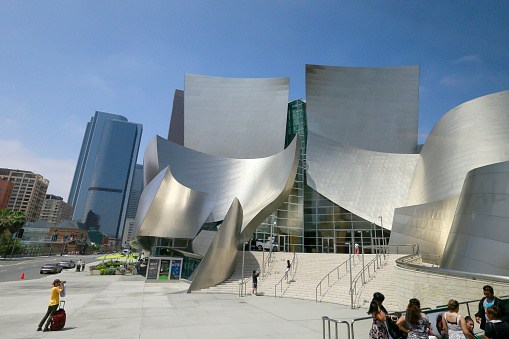 Los Angeles, USA - may 31, 2015: tourist in front the Walt Disney Concert Hall . Designed by architect Frank Gehry, is home of the Los Angeles Philharmonic orchestra and the Los Angeles Master Chorale