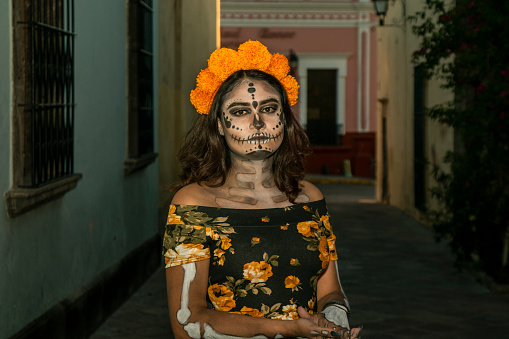 Woman painted catrina by day of the dead