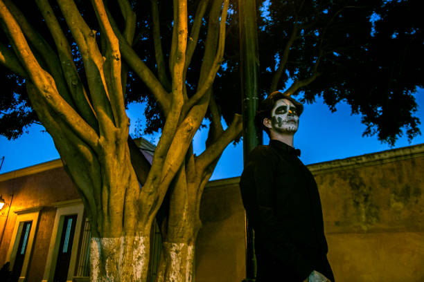 Man painted catrin by day of the dead