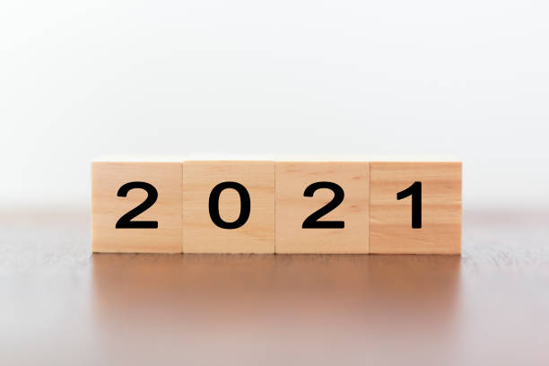 istock New year 2021 on wooden cubes on table with copy space for text 1284301519