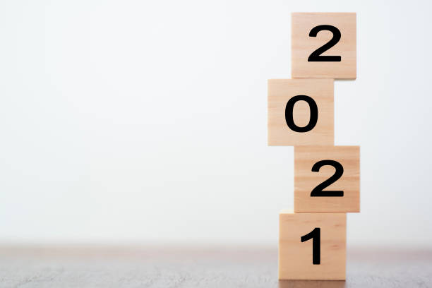 istock New year 2021 on wooden cubes on table with copy space for text 1284301522