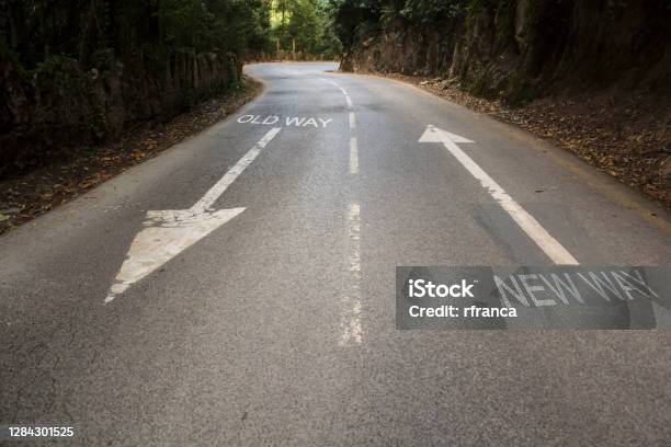 Road With The Inscription Old Way New Way With Directional Arrows Concept For Change Improvement And Selfdevelopment Stock Photo - Download Image Now