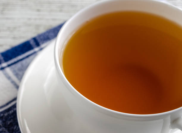 istock Cup of Green Tea on Saucer 1284309665