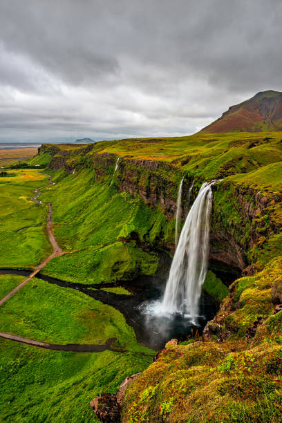istock Seljalandsfoss waterfall in a cloudy day, Iceland 1284310384