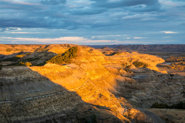 istock Sunlit Badlands Landscape in North Dakota 1284311169