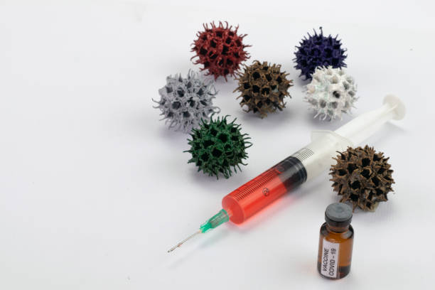 istock coronavirus, syringe and vaccine 1284317682