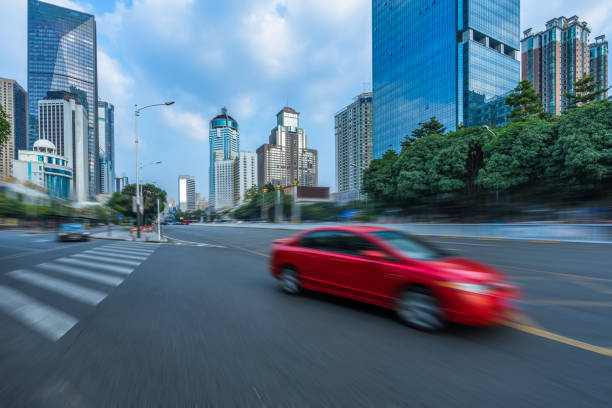istock City road with moving traffic 1284319385