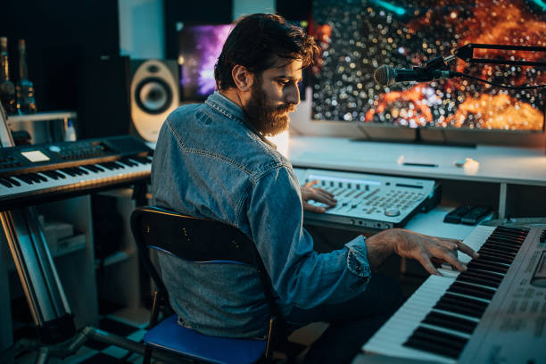 istock One young producer working in professional studio 1284320513