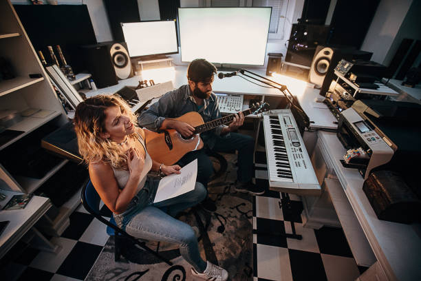 istock Two young musician composing music in the studio 1284324807