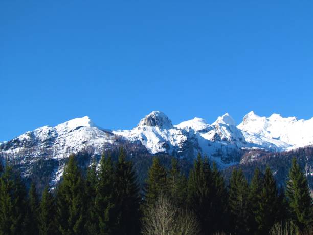 istock snow covered mountain peaks in Julian alps 1284325469