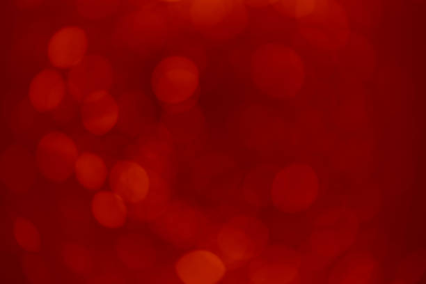Defocused Christmas red lights background.