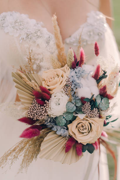 istock Wedding bridal bouquet of various flowers 1284338471
