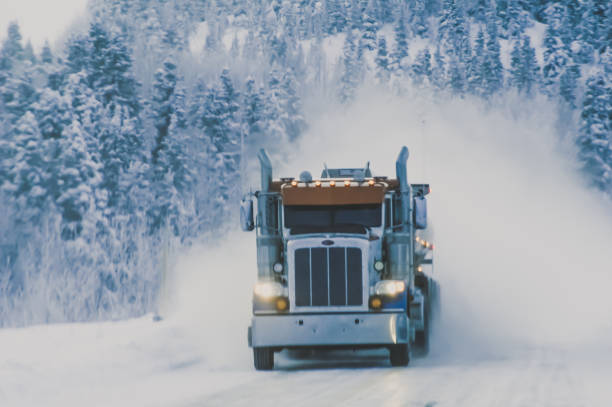 Trucking in Alaska Trucking in Alaska comes with amazing scenery and travel challenges. On this day in late winter, the truck traveled with ease towards Fairbanks, Alaska fairbanks photos stock pictures, royalty-free photos & images