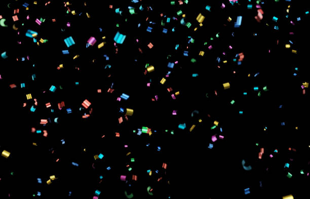 istock Colorful Confetti On Black Background 1284339440