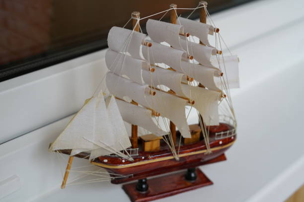 istock Small model of a sea vessel with sails. 1284346758