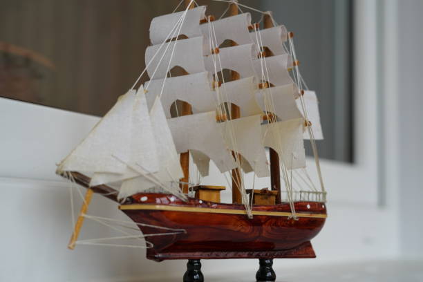 istock Small model of a sea vessel with sails. 1284346765