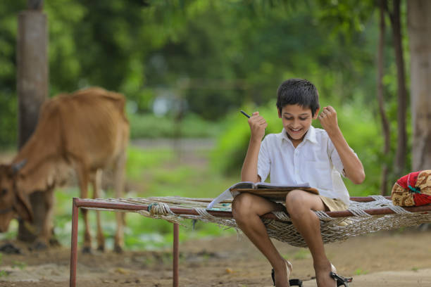 istock Cute little child studying at home and showing excited expression 1284350354
