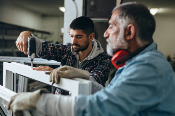 istock Aluminium and PVC industry workers 1284352423