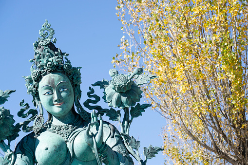 Blue statue of the Buddhist goddess Tara