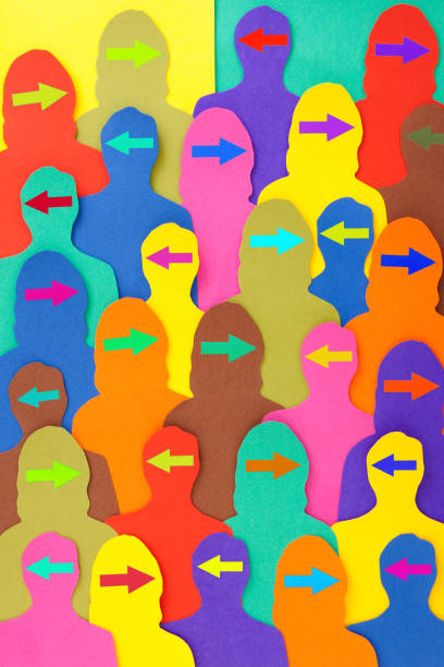 istock Arrowhead men and women pointing in opposite directions 1284354702