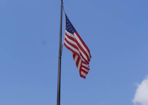 istock A United States flag waving from a pole 1284355128