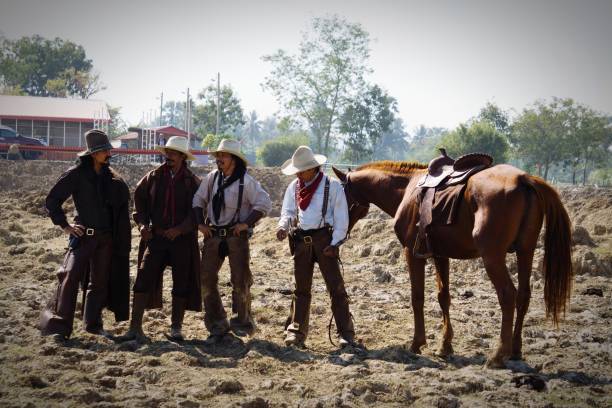 istock Horses Standing On Field Against Sky 1284358964