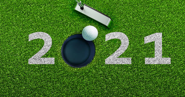 istock Golf Motiv 2021 Text on Grass Background 1284359060