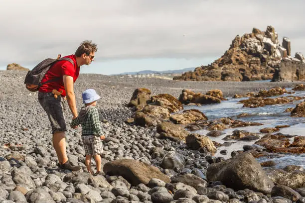 Photo of Dad and son on Cobble Beach near Yaquina Head