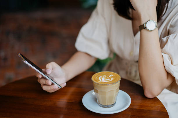 istock An Asian Chinese woman using smartphone in cafe 1284365644