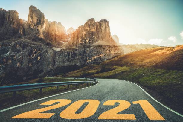 istock 2021 New Year road trip travel and future vision concept . 1284368423