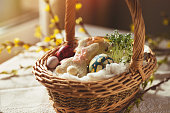 Polish Easter basket with Easter bunny, cress sprouts, egg and bread