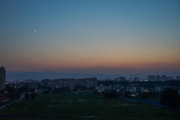 istock Sunset moon outside the window in the evening 1284374895