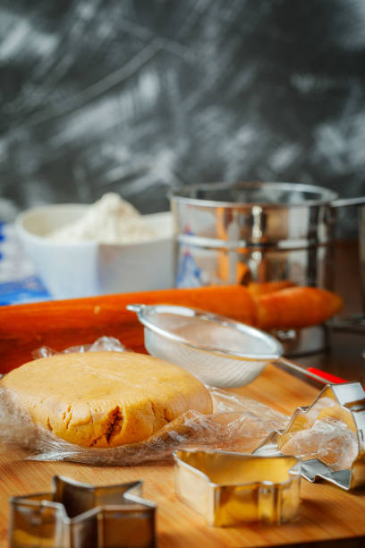 istock table set up for cookies cooking, christmas gingerbrad cookies work in progress 1284381533