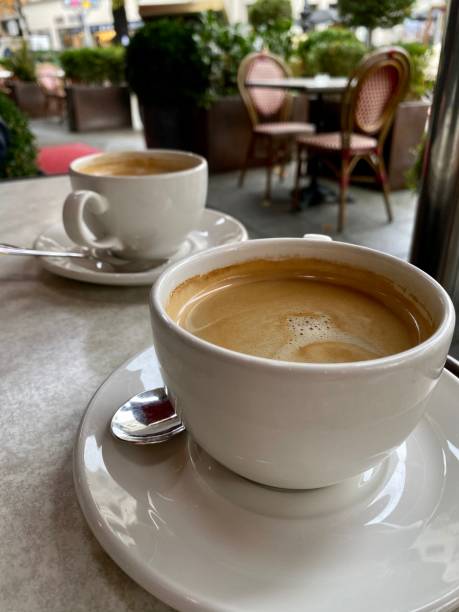 istock two white cups of cappuccino 1284382612