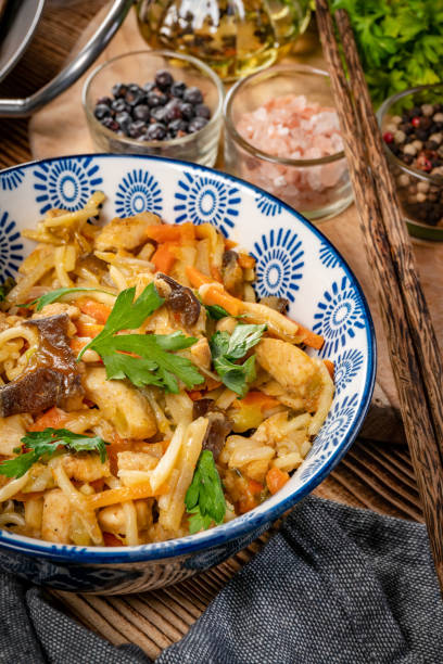 istock Fried noodles with chicken and vegetables. 1284382622