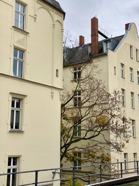 istock old buildings in berlin with trees 1284382931