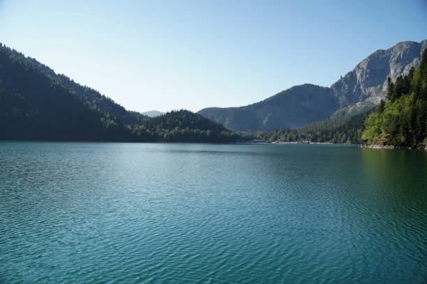 istock Alpine lake Ritsa in Abkhazia. 1284388328