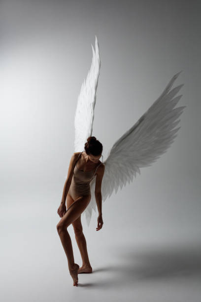 istock Angel woman posing 1284389855