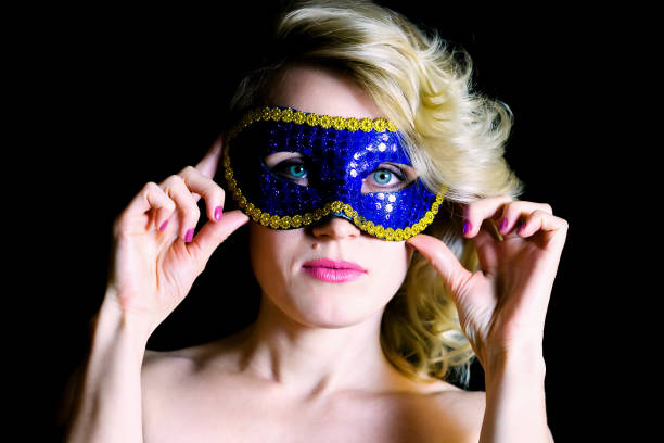 istock Blue carnival mask with eye holes. 1284395763