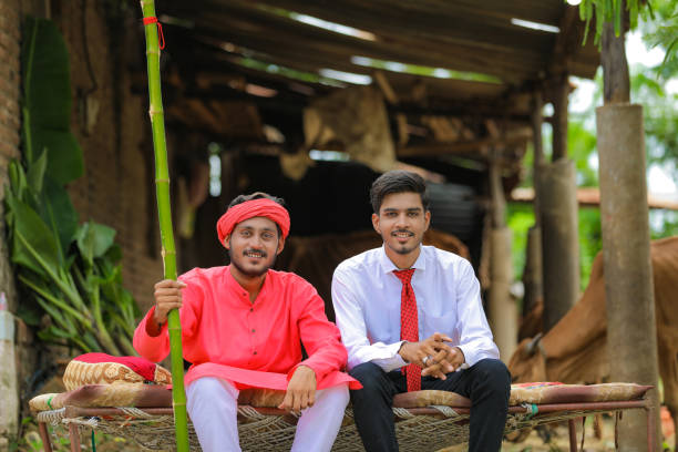 young indian farmer with agronomist or banker at home - child office chaos computer monitor imagens e fotografias de stock