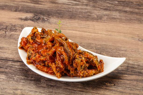 istock Canned anchovy in tomato sauce 1284399520