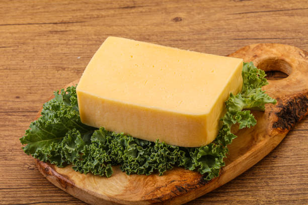 istock Tasty yelloow Tilsiter cheese brick 1284399677