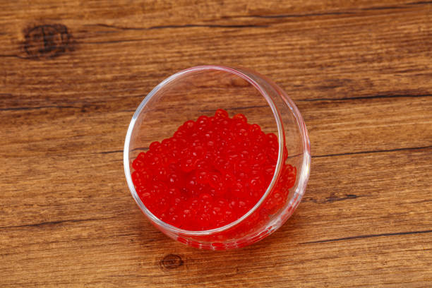 istock Red salmon caviar in the bowl 1284399732