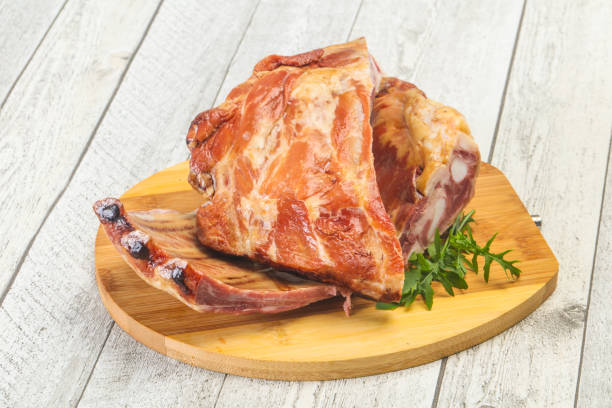 istock Smoked pork ribs over the wooden background 1284399843