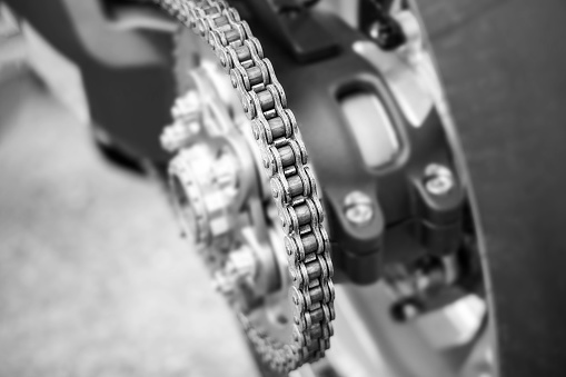 inspection of the chain of the motorcycle