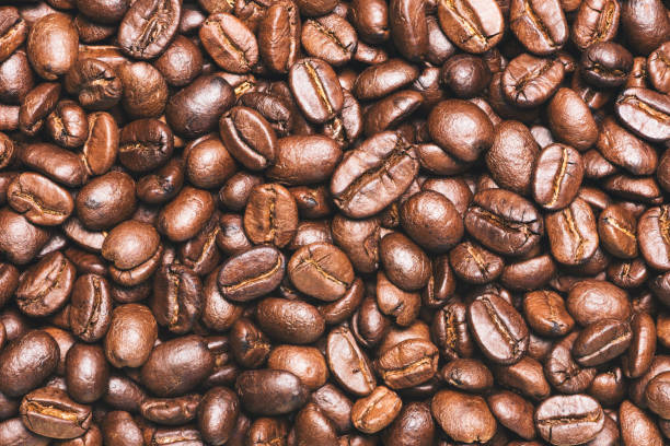 Roasted coffee beans background, Photo coffee close up Roasted coffee beans background, Photo coffee close up baseball rundown stock pictures, royalty-free photos & images