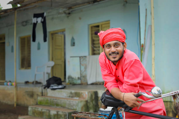 istock Young indian farmer in traditional wear 1284405588