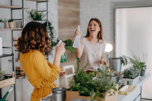 istock Young women planting spices indoors 1284406578