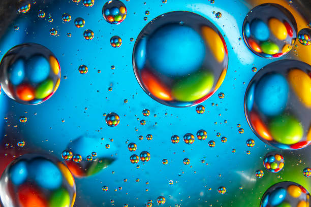 istock abstract colored balls of oily liquid on a blurred background. 1284406893