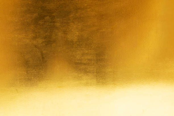 istock Gold abstract background or texture and gradients shadow 1284407090